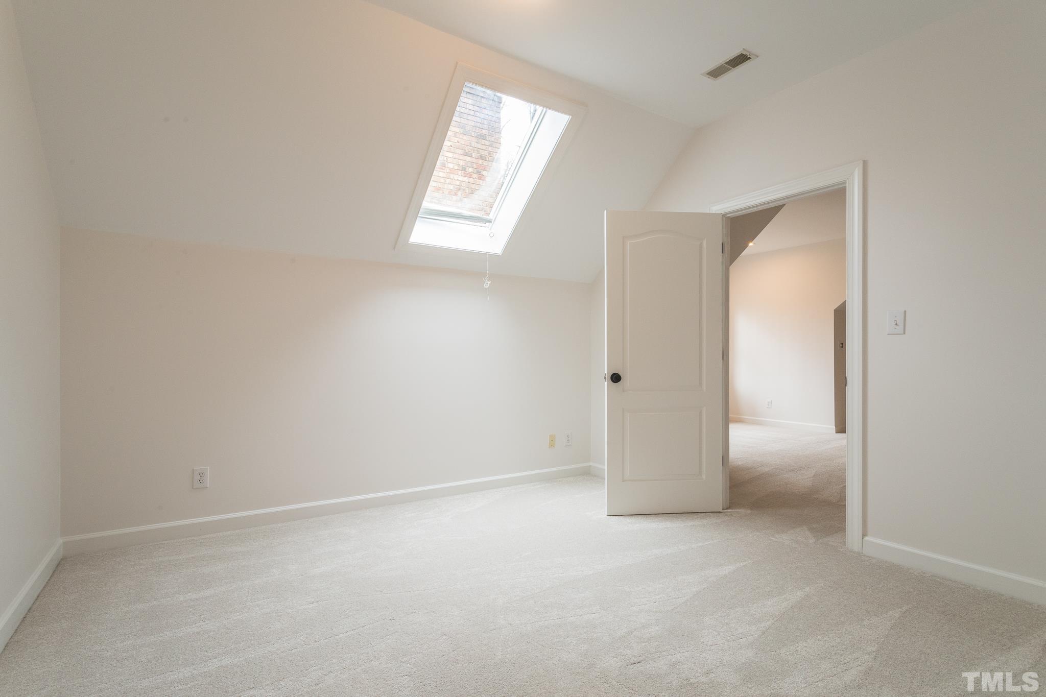 2308 Hideaway Court Raleigh, NC 27613 - Photo 34 of 43 an empty room with windows and closet