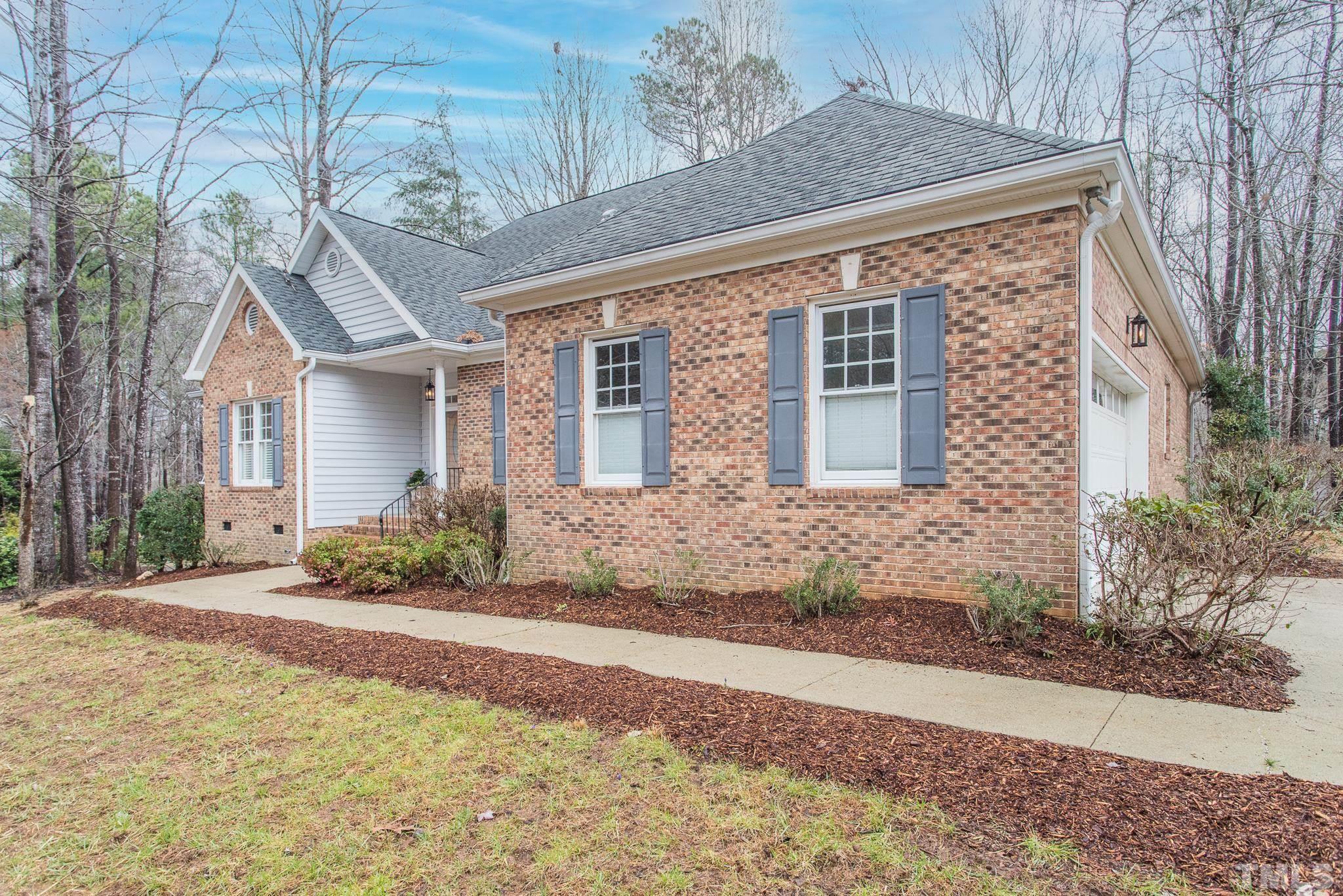 2308 Hideaway Court Raleigh, NC 27613 - Photo 37 of 43 a front view of a house with a yard