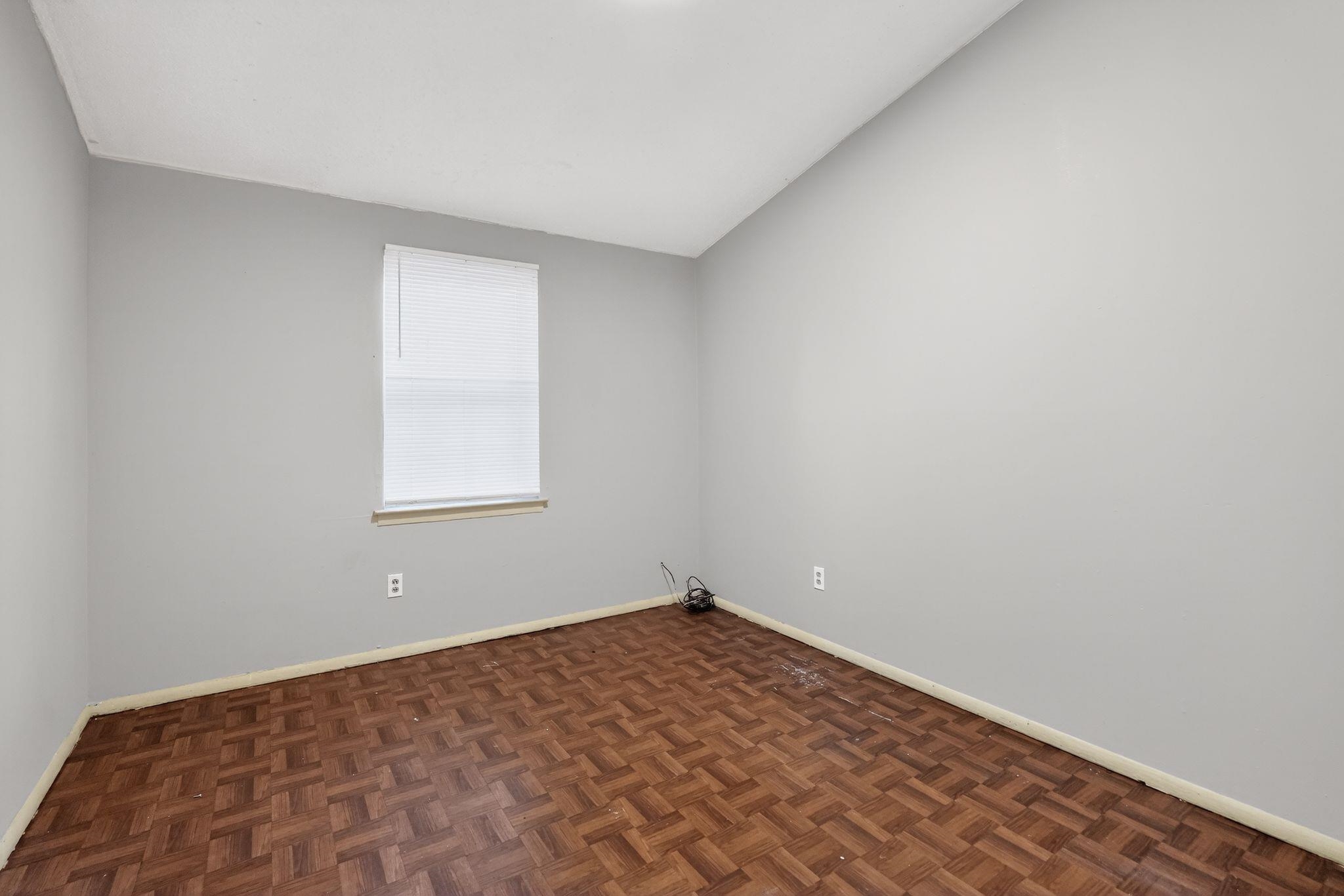 4504 Neely Road Memphis, TN 38109 - Photo 26 of 32 an empty room with a window