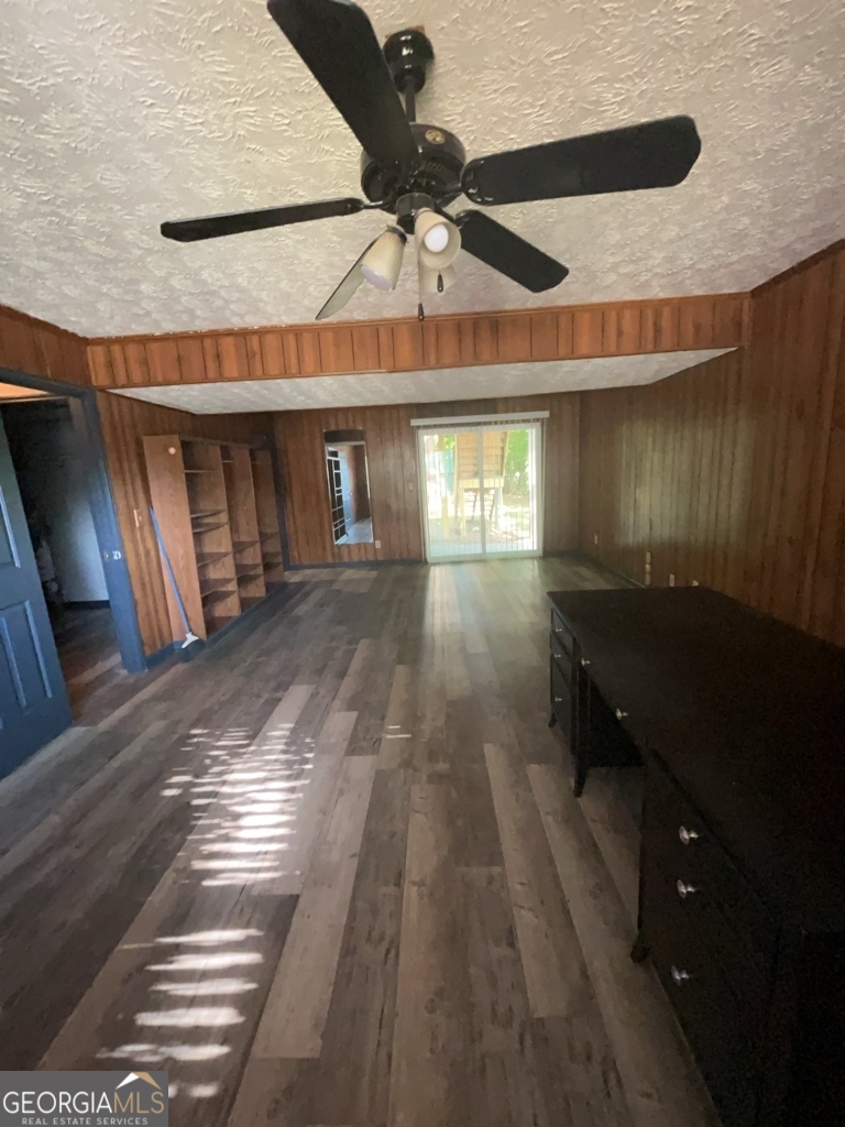 1265 Herrington Road Lawrenceville, GA 30044 - Photo 37 of 52 a view of empty room with wooden floor