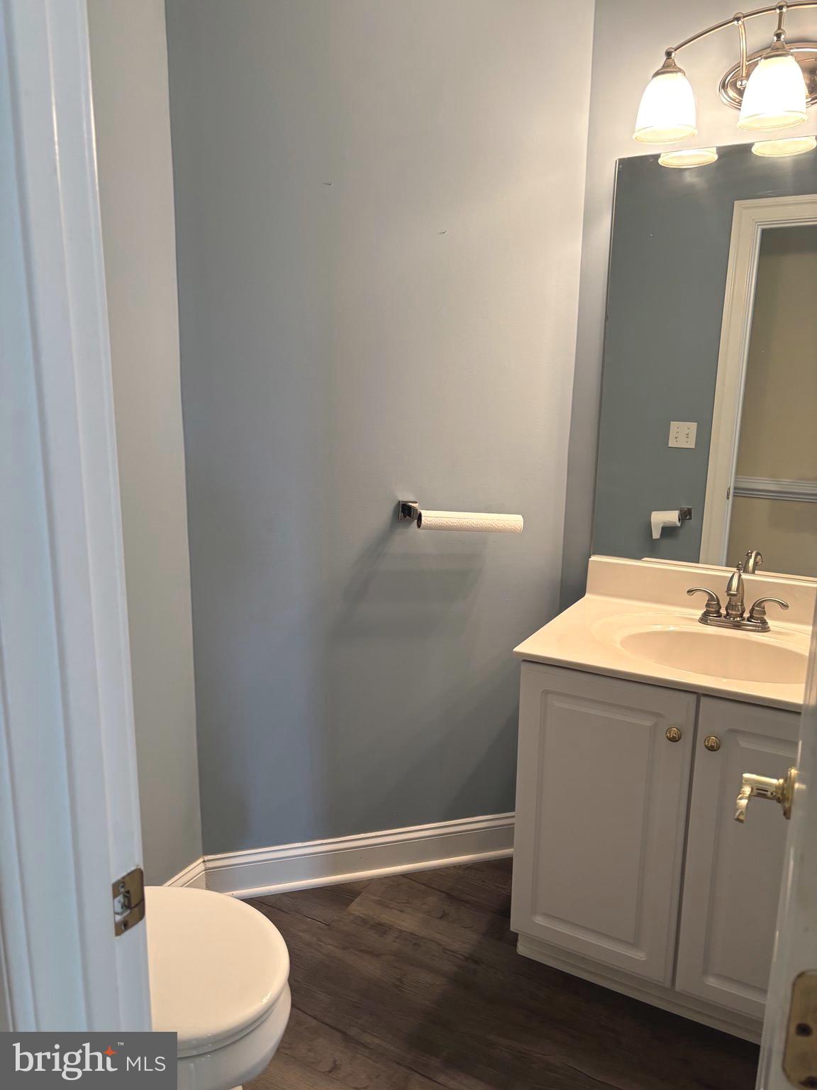 629 Country Club Road Culpeper, VA 22701 - Photo 12 of 27 a bathroom with a sink mirror vanity and toilet