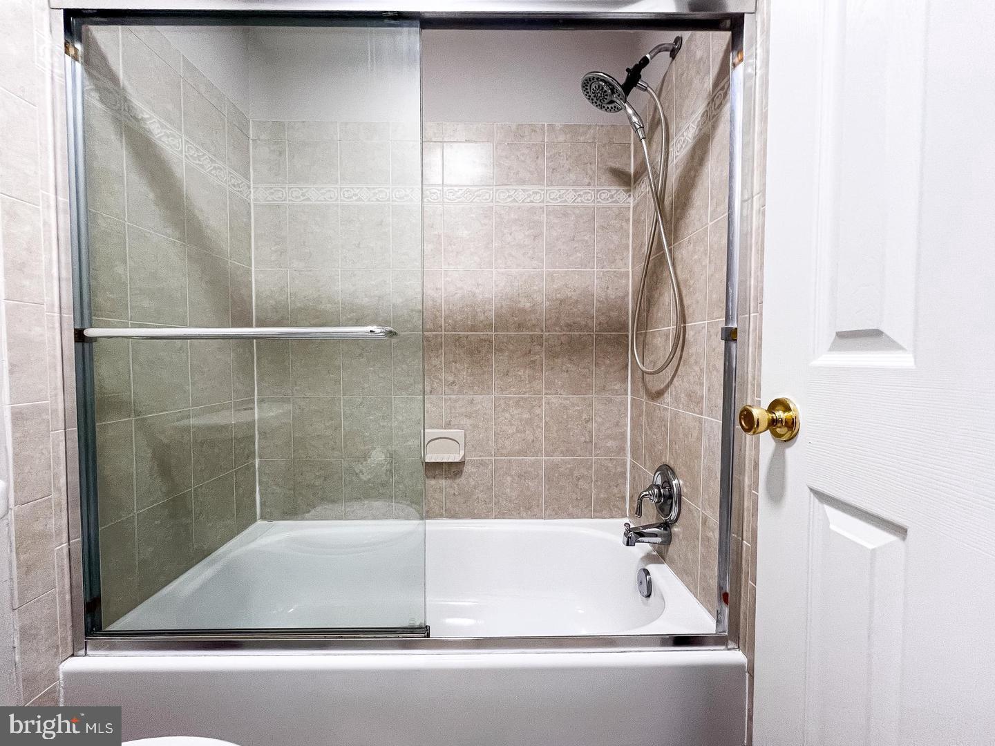 14913 Lear Lane Silver Spring, MD 20905 - Photo 24 of 33 Sleek modern bath with glass enclosure.