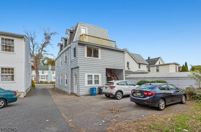 a car parked in front of a house