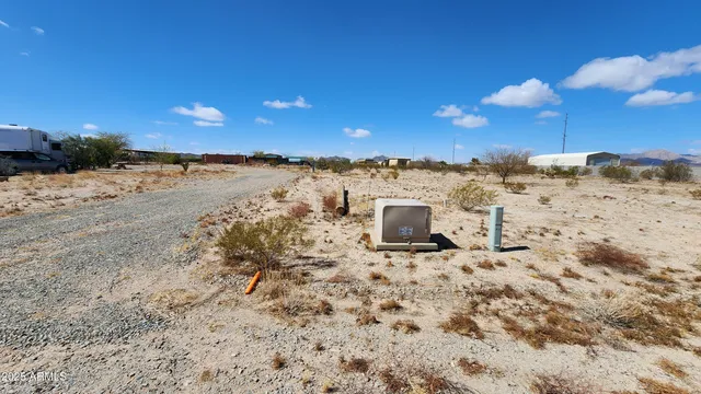 a view of a beach with a terrace of the house