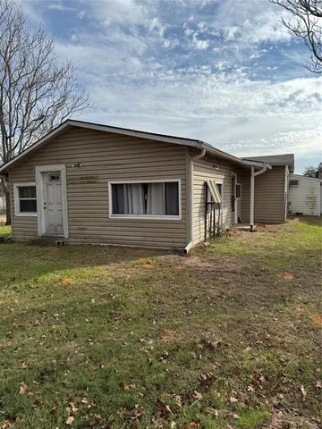 a front view of house with yard