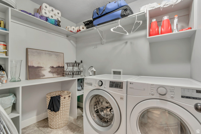1071 Jamie-Matt Circle Layton, UT 84041 - Photo 19 of 28 Laundry area featuring washing machine and dryer