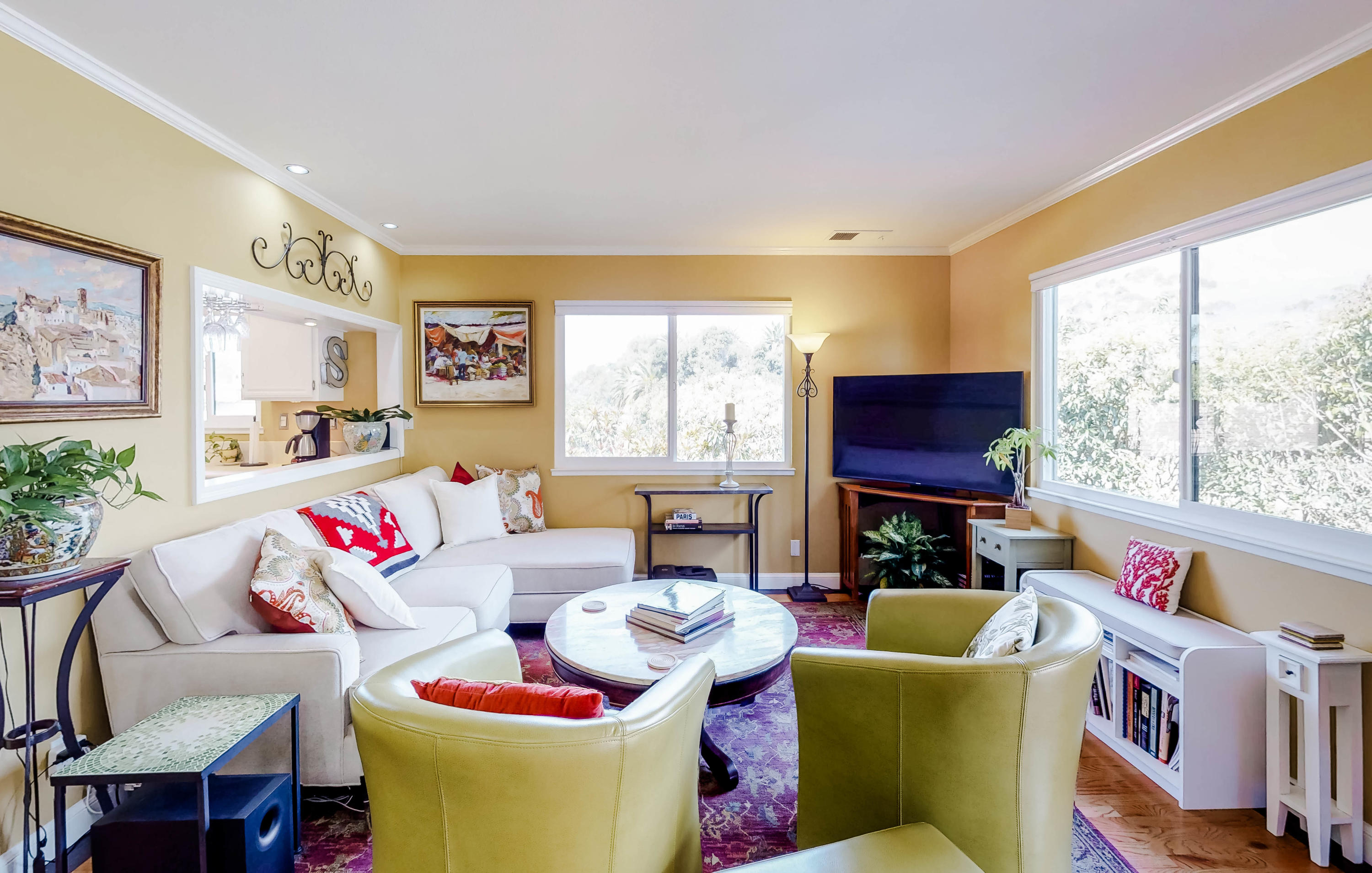 4344 Modoc Road, Unit 16 Santa Barbara, CA 93110 - Photo 6 of 11 a living room with furniture and a large window