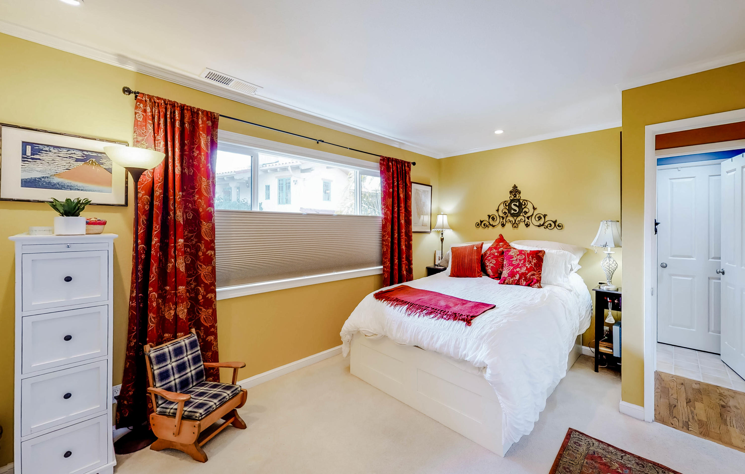 4344 Modoc Road, Unit 16 Santa Barbara, CA 93110 - Photo 8 of 11 a bedroom with a bed and a window
