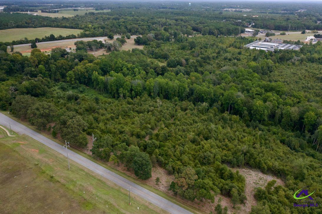 Airport Road Perry, GA 31069 - Photo 6 of 23 an aerial view of residential houses with outdoor space and trees