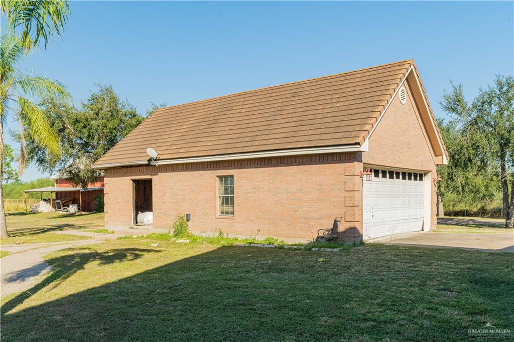234 East Earling Road Alamo, TX 78516 - Photo 6 of 13 a view of a house with a yard