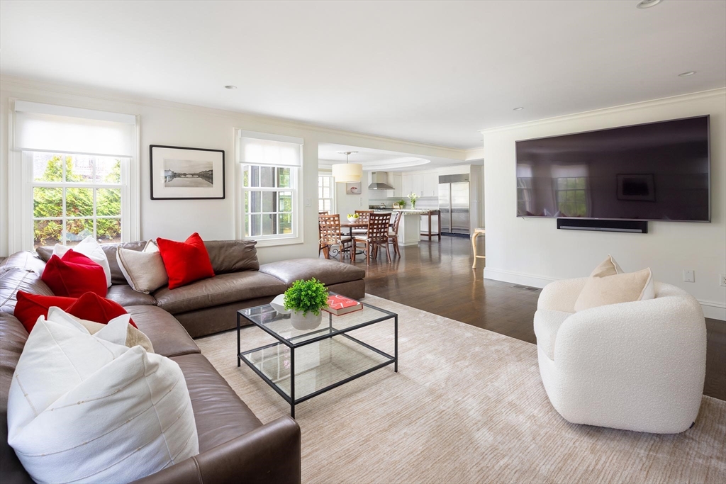 225 Arnold Road Newton, MA 02459 - Photo 11 of 20 a living room with furniture and a flat screen tv