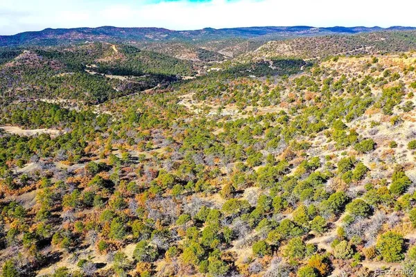 a view of a field with an outdoor space