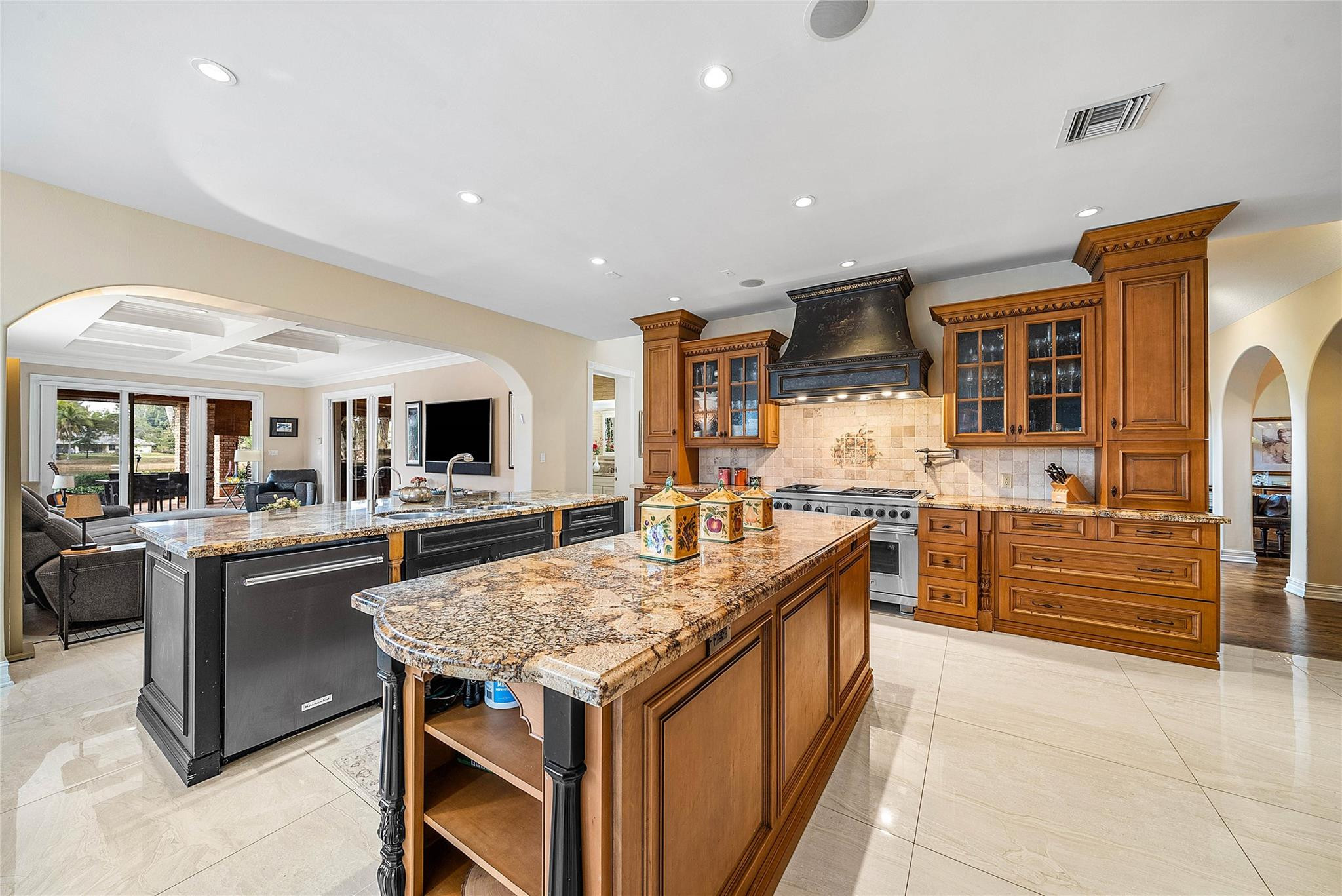 8035 Dillman Road West Palm Beach, FL 33411 - Photo 23 of 70 a kitchen with granite countertop kitchen island stainless steel appliances a sink and counter space