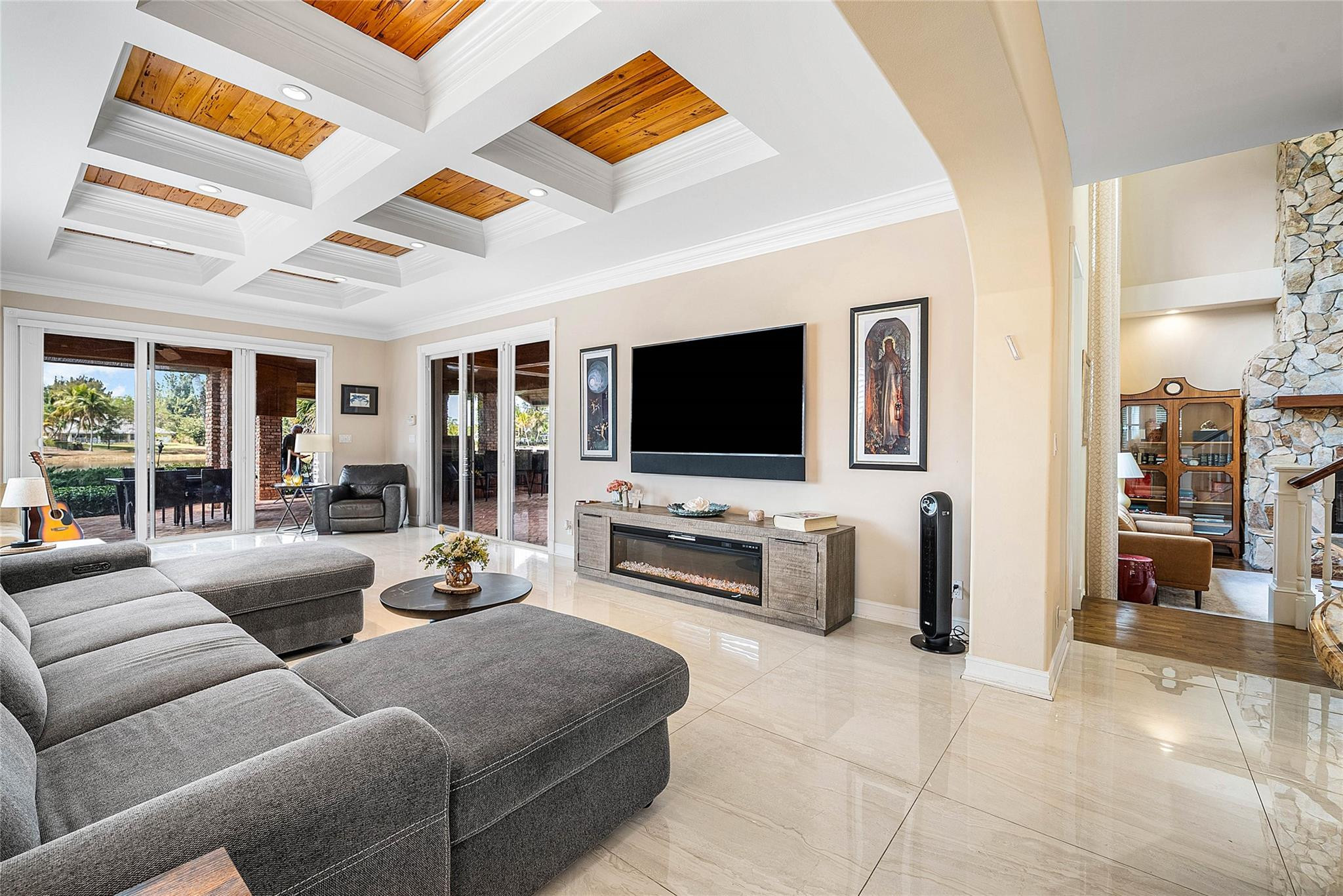 8035 Dillman Road West Palm Beach, FL 33411 - Photo 24 of 70 a living room with furniture and a flat screen tv