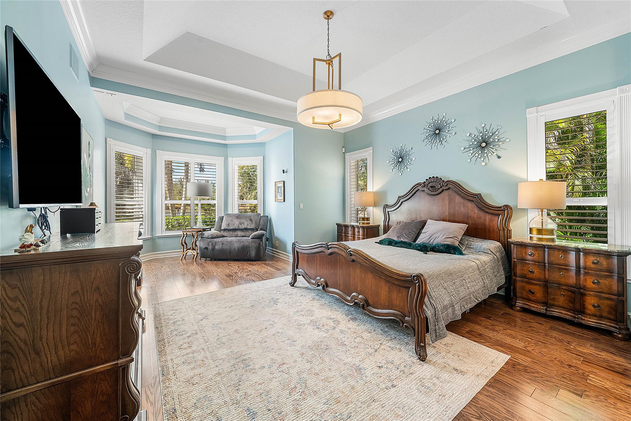 8035 Dillman Road West Palm Beach, FL 33411 - Photo 26 of 70 a bedroom with furniture and a flat screen tv