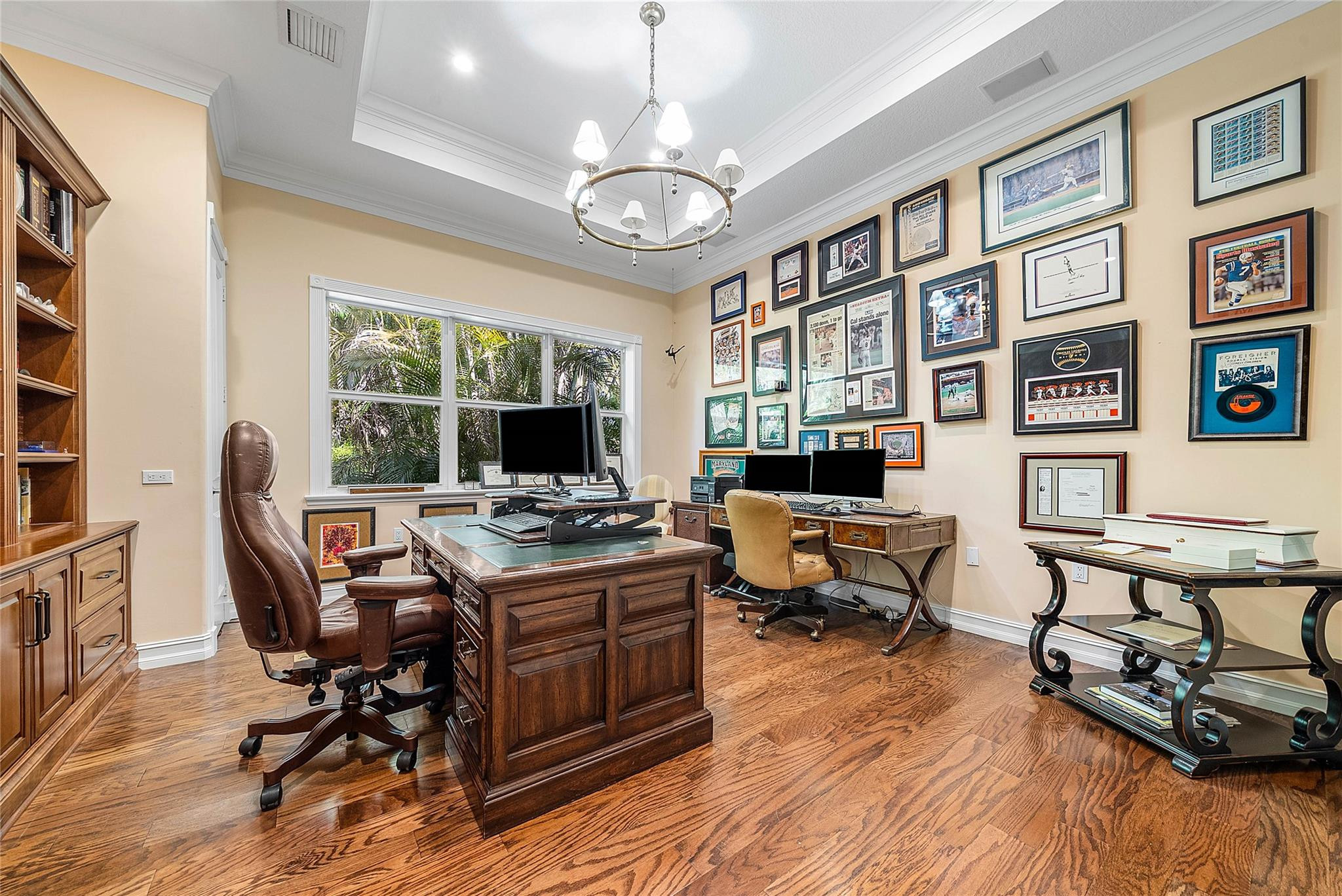 8035 Dillman Road West Palm Beach, FL 33411 - Photo 30 of 70 a view of a workspace with furniture window and wooden floor