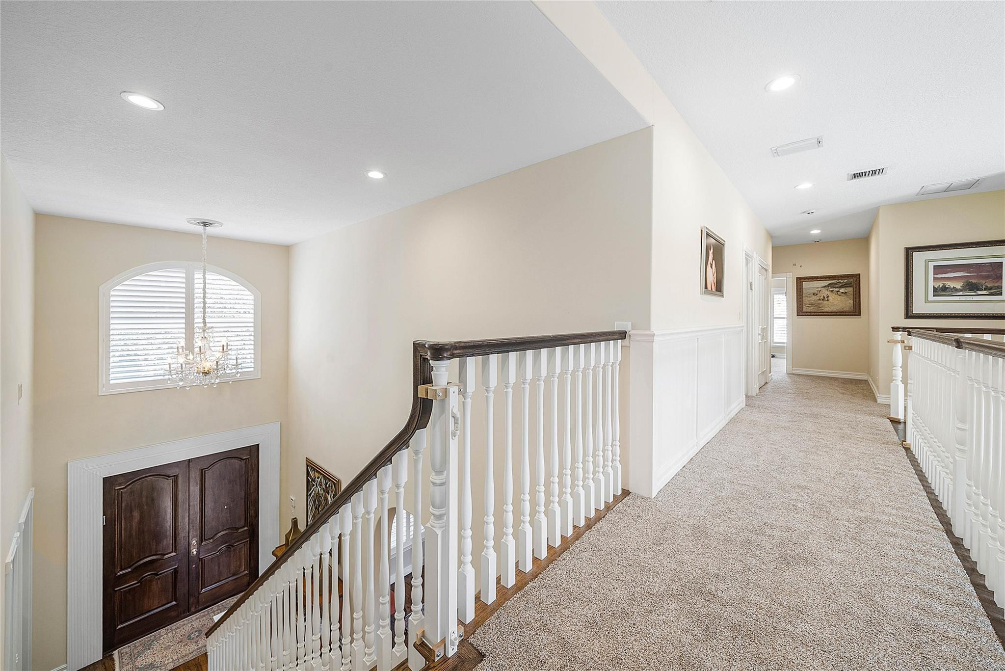 8035 Dillman Road West Palm Beach, FL 33411 - Photo 33 of 70 a view of a hallway to a livingroom with furniture stairs and windows