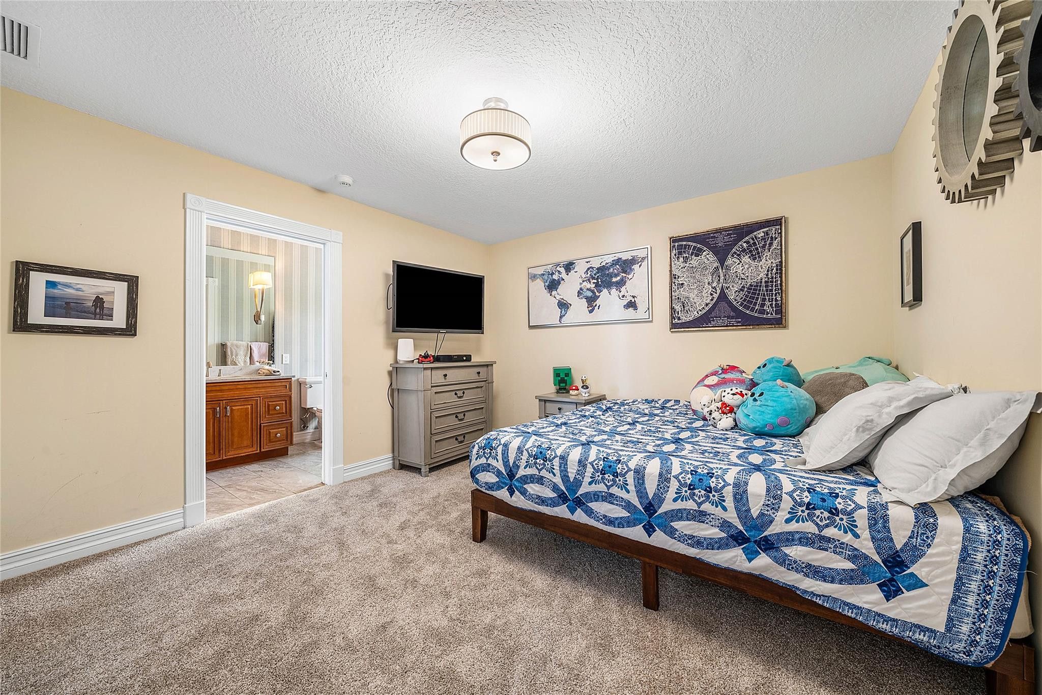 8035 Dillman Road West Palm Beach, FL 33411 - Photo 36 of 70 a bedroom with a bed and a television