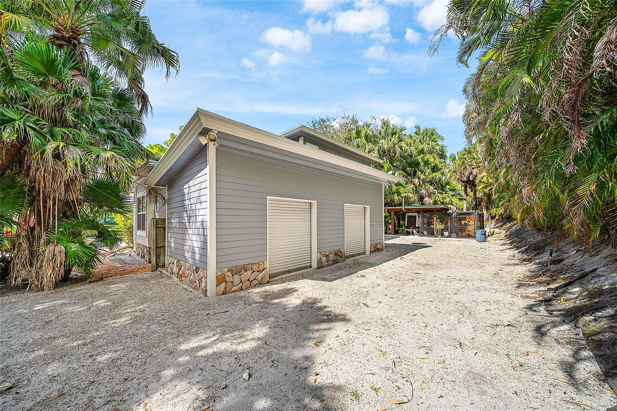8035 Dillman Road West Palm Beach, FL 33411 - Photo 42 of 70 a view of a house with a yard and tree