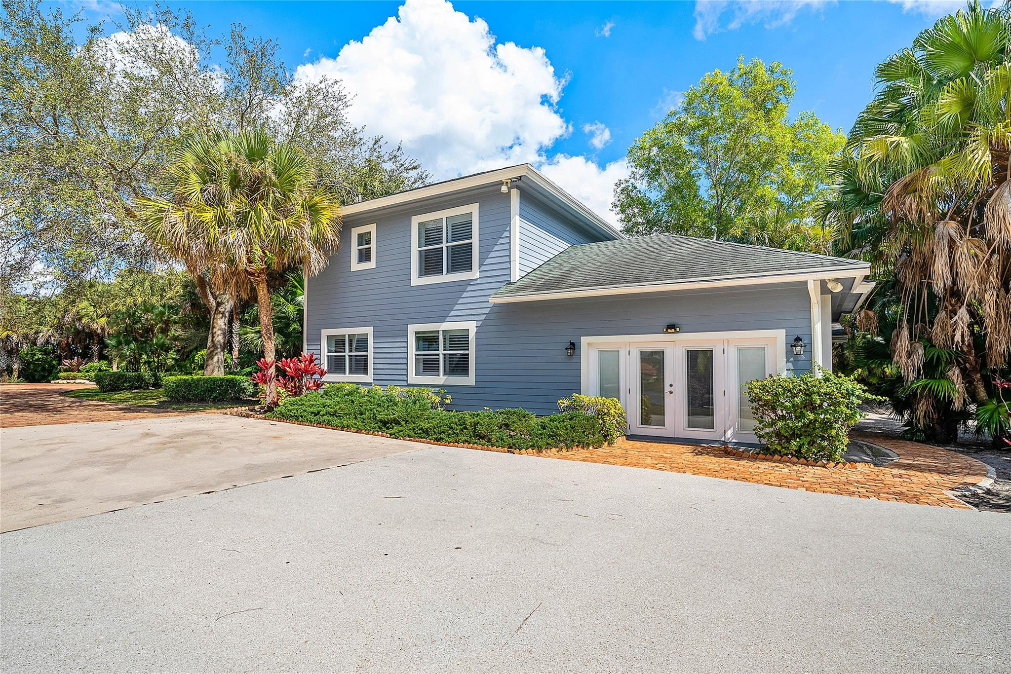 8035 Dillman Road West Palm Beach, FL 33411 - Photo 43 of 70 front view of house with a yard
