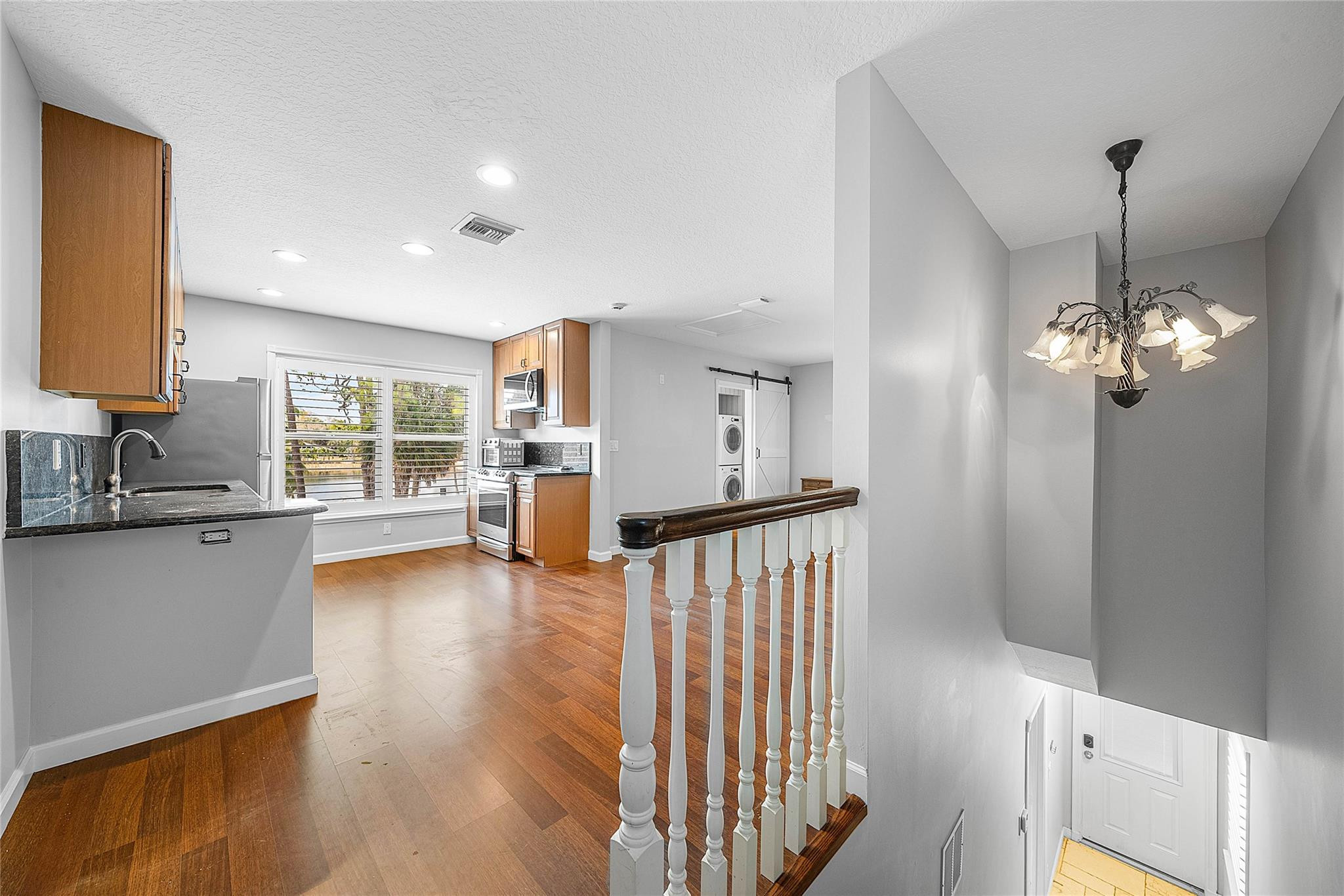 8035 Dillman Road West Palm Beach, FL 33411 - Photo 50 of 70 a view of a room with wooden floor and windows