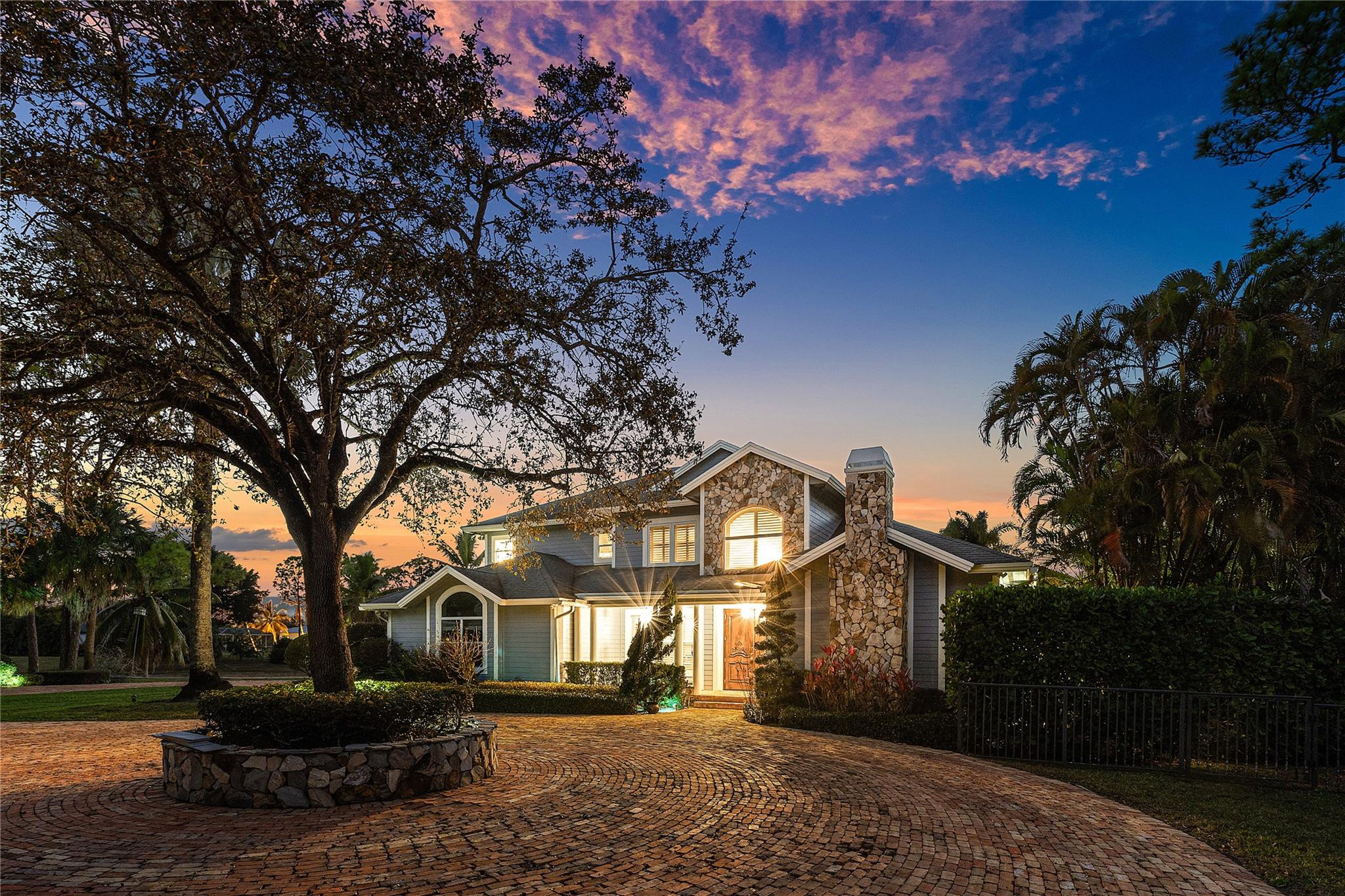 8035 Dillman Road West Palm Beach, FL 33411 - Photo 62 of 70 a front view of a house with a yard