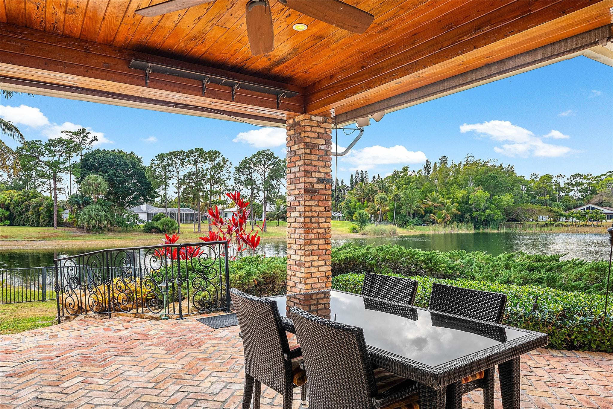 8035 Dillman Road West Palm Beach, FL 33411 - Photo 67 of 70 a view of an outdoor sitting area with swimming pool