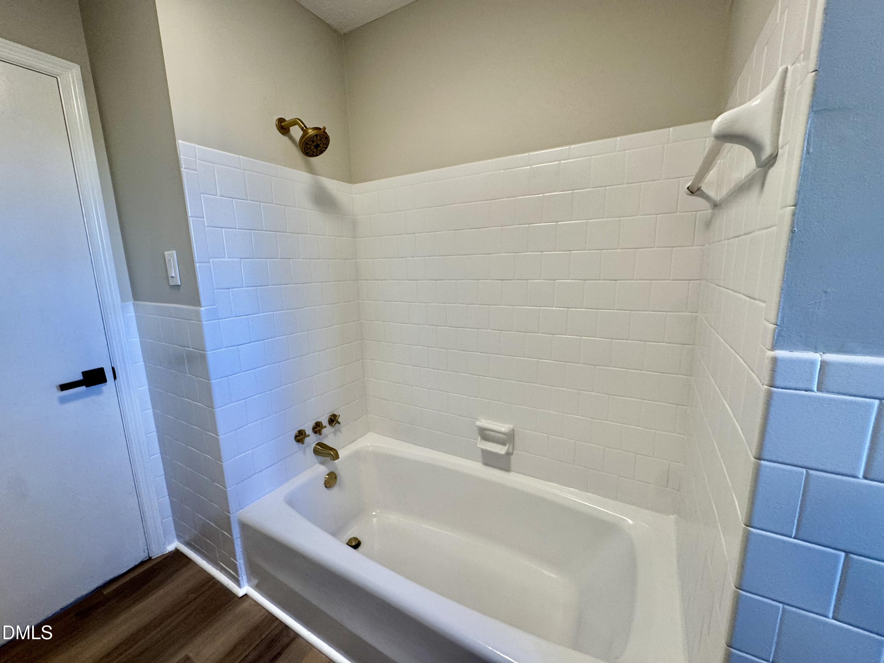 727 High Rock School Road Blanch, NC 27212 - Photo 11 of 29 a bathroom with a tub