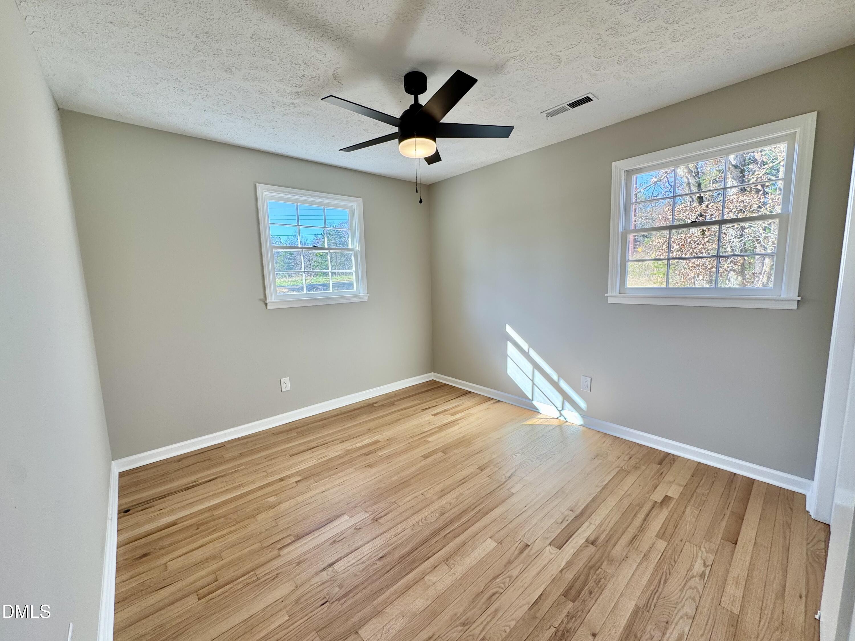 727 High Rock School Road Blanch, NC 27212 - Photo 18 of 29 a view of an empty room with a window