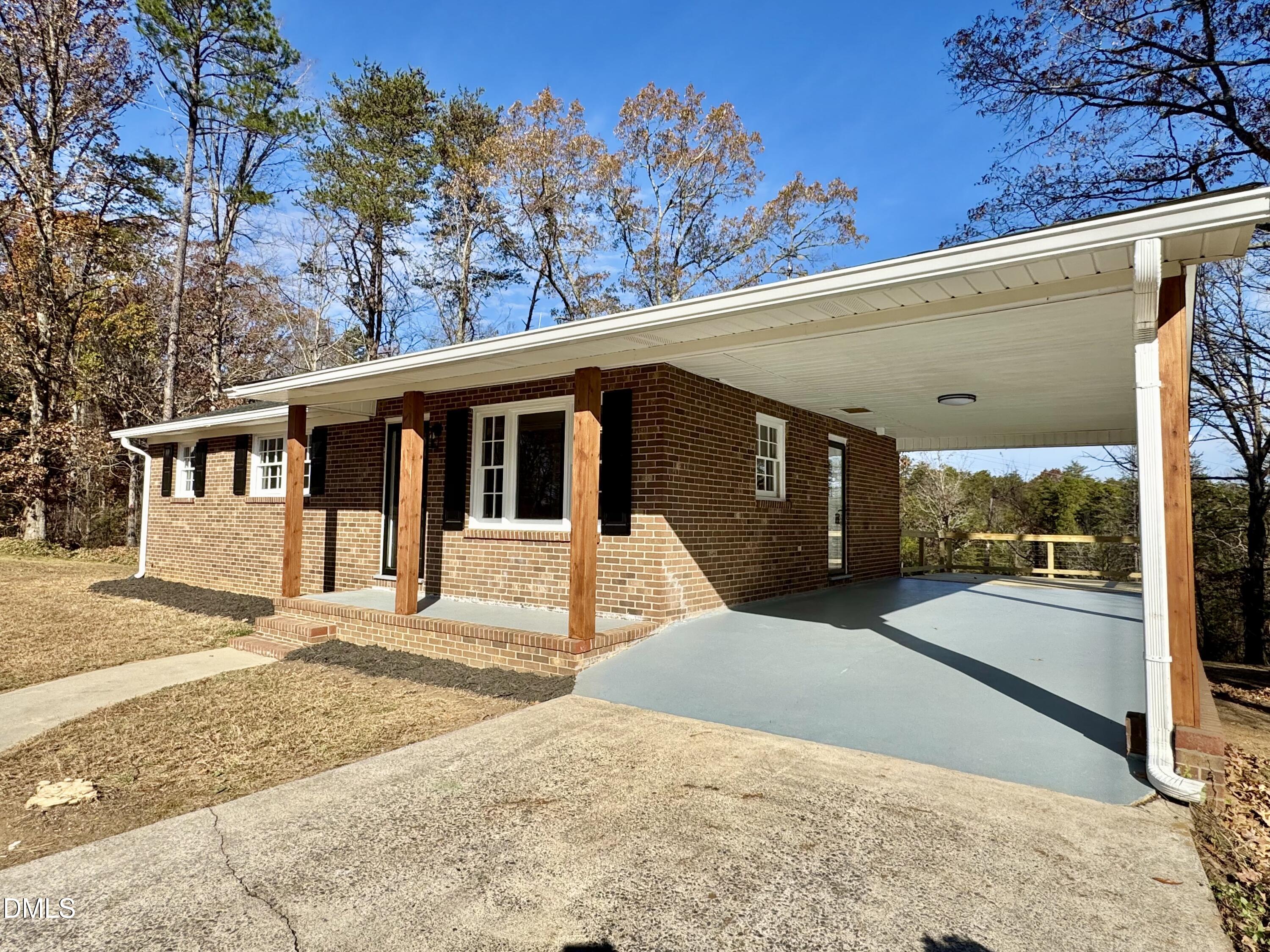 727 High Rock School Road Blanch, NC 27212 - Photo 27 of 29 a view of a house with a outdoor space