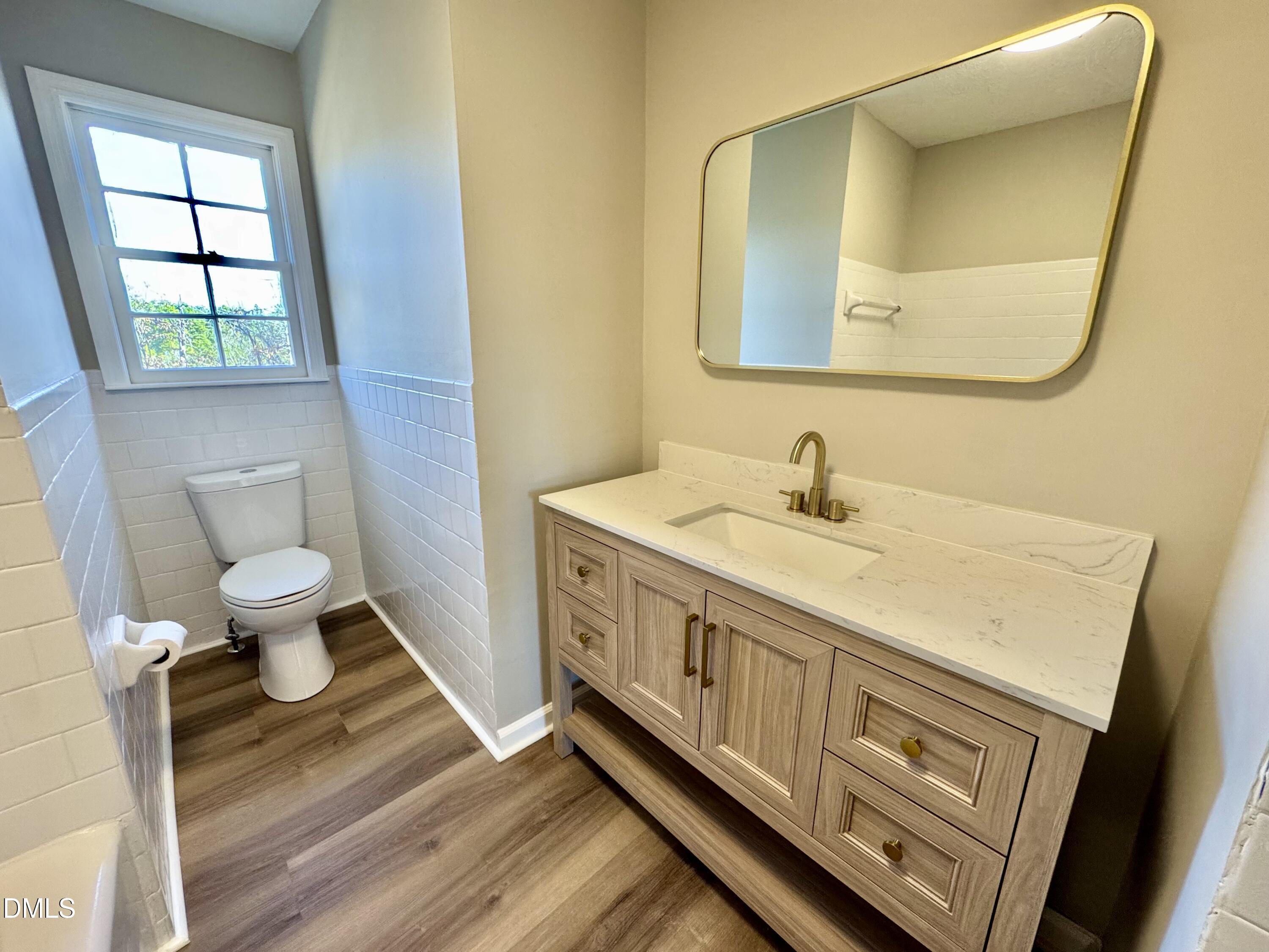 727 High Rock School Road Blanch, NC 27212 - Photo 9 of 29 a spacious bathroom with a double vanity sink and a mirror