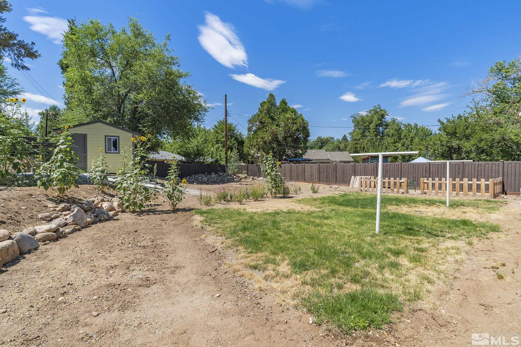 50 Kaye Way Reno, NV 89509 - Photo 15 of 16 a view of a house with backyard and a tree