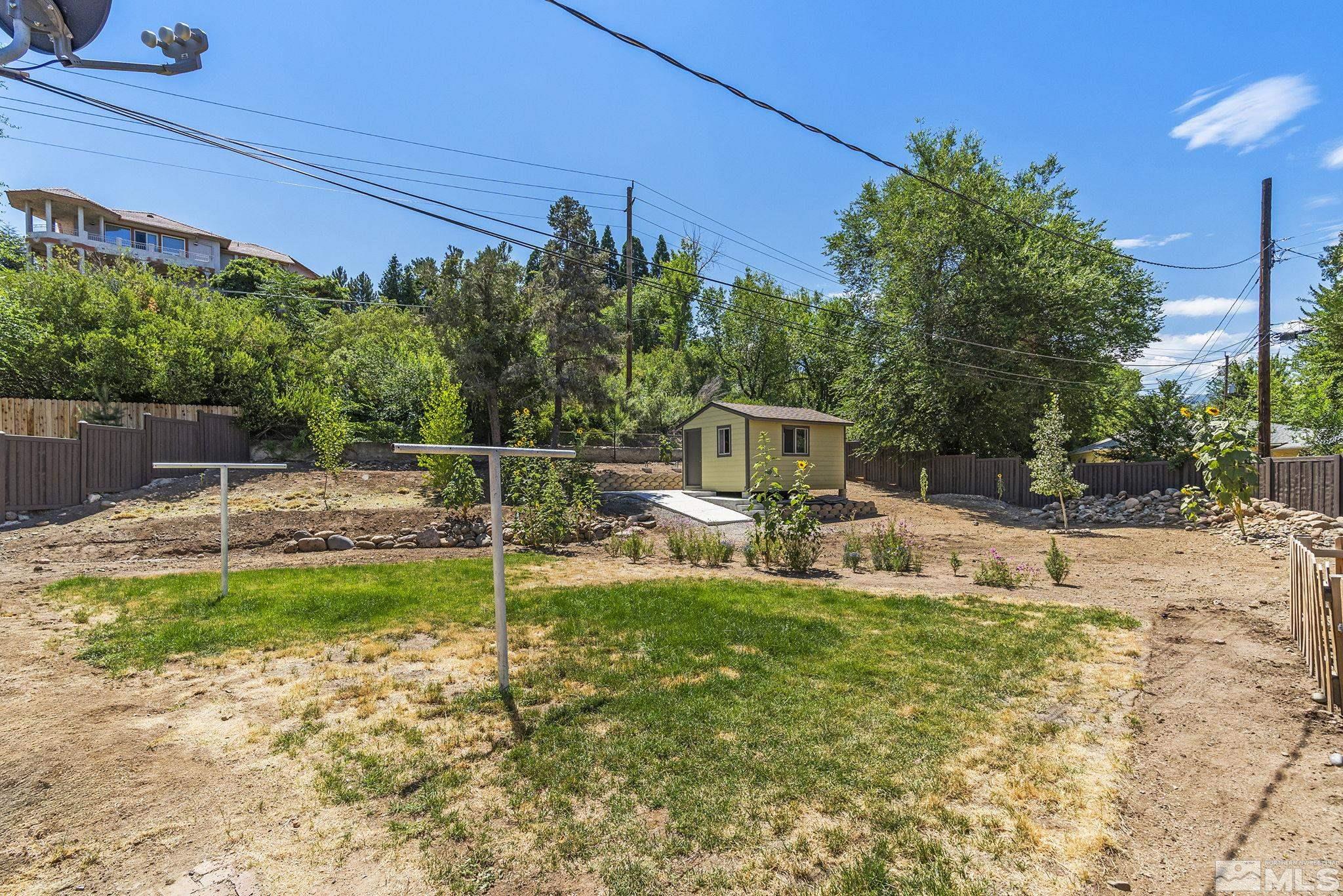 50 Kaye Way Reno, NV 89509 - Photo 16 of 16 a view of a house with backyard and sitting area