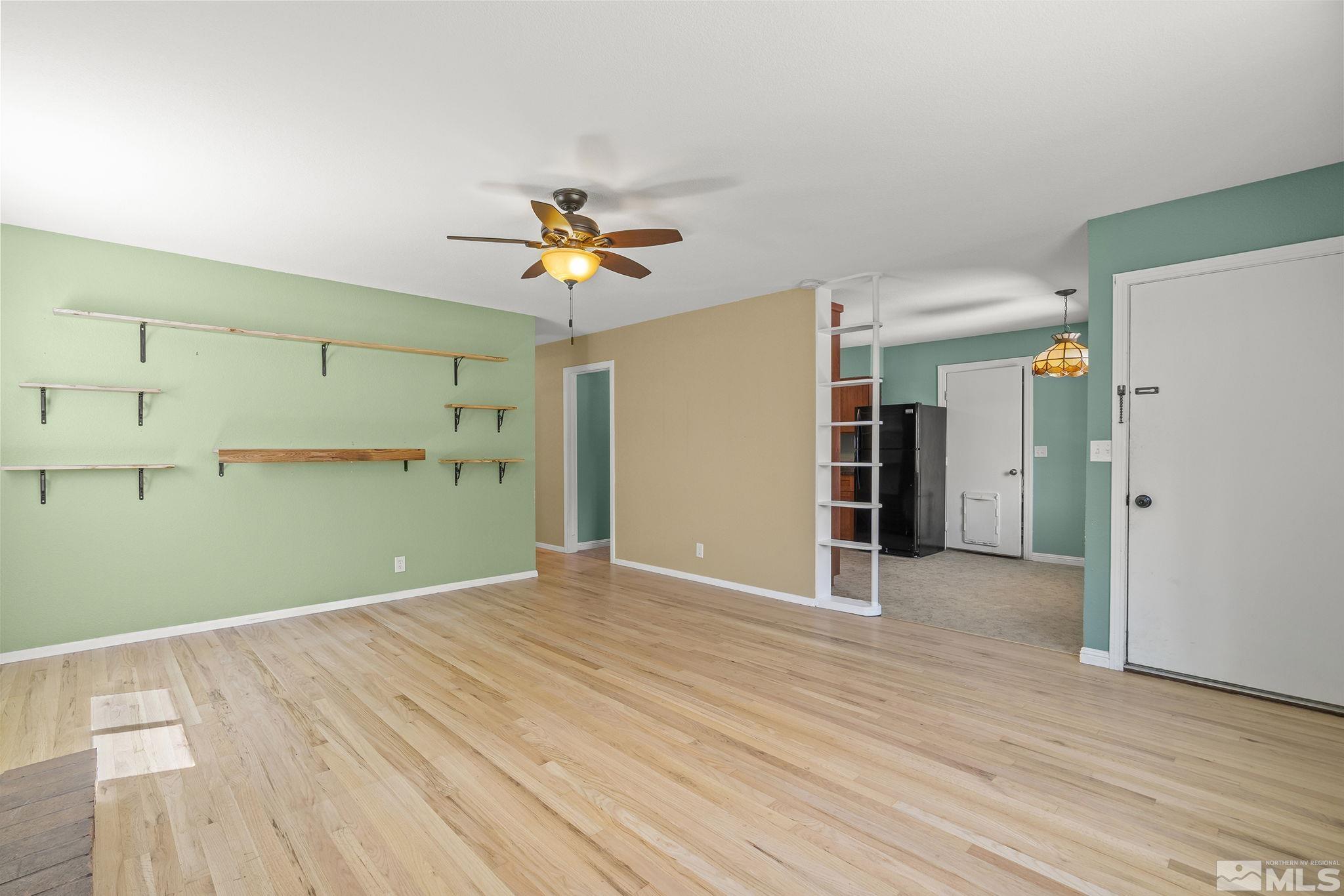 50 Kaye Way Reno, NV 89509 - Photo 4 of 16 a view of a livingroom with a garage
