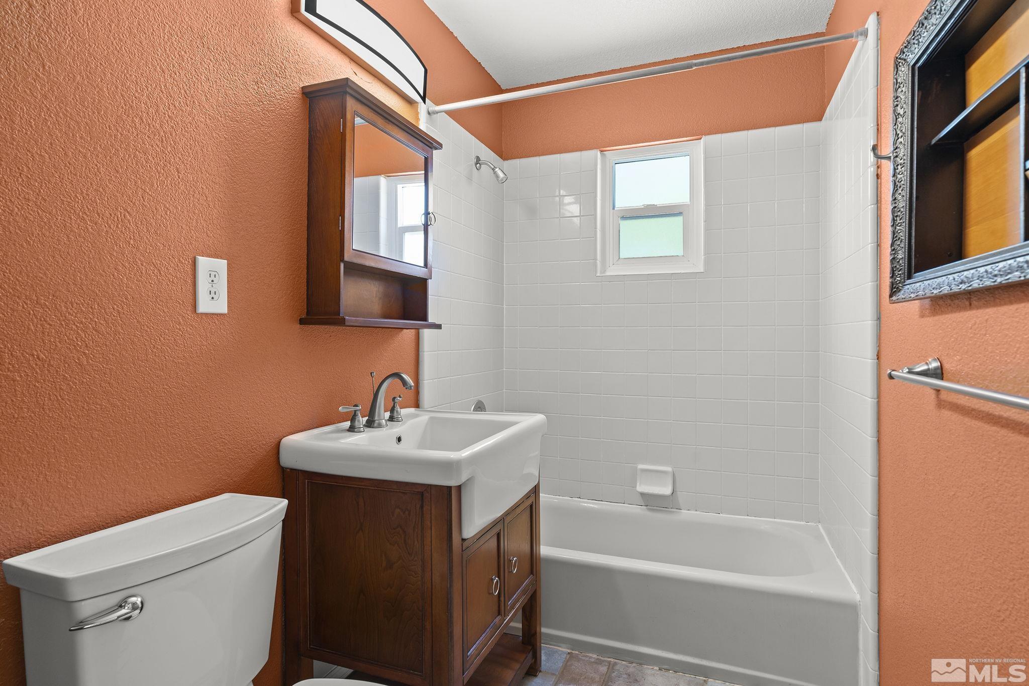 50 Kaye Way Reno, NV 89509 - Photo 9 of 16 a bathroom with a sink toilet and shower