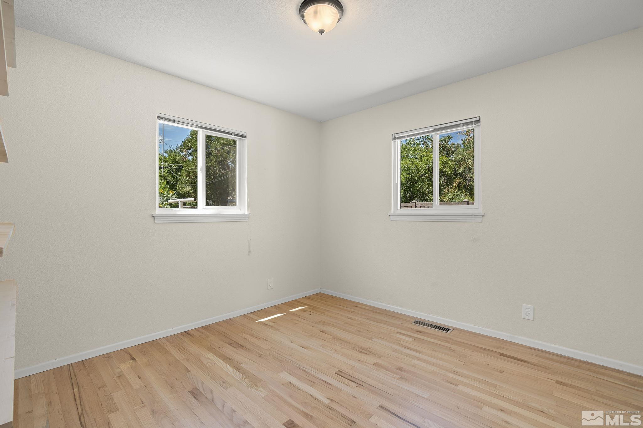 50 Kaye Way Reno, NV 89509 - Photo 10 of 16 an empty room with windows and closet