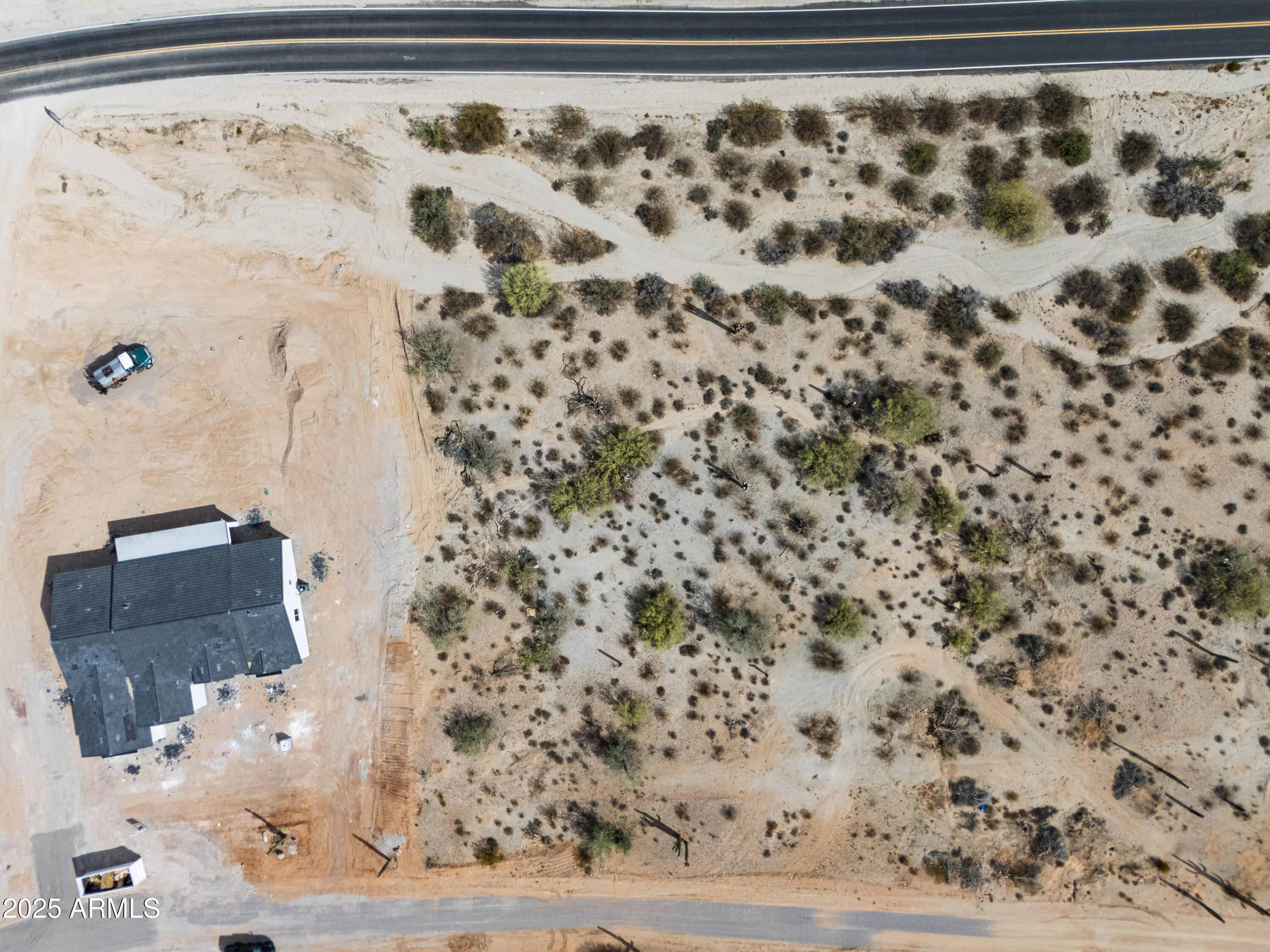 0 North Brenner Pass Road, Unit F Queen Creek, AZ 85144 - Photo 18 of 20 a bathroom with a shower curtain and a sink