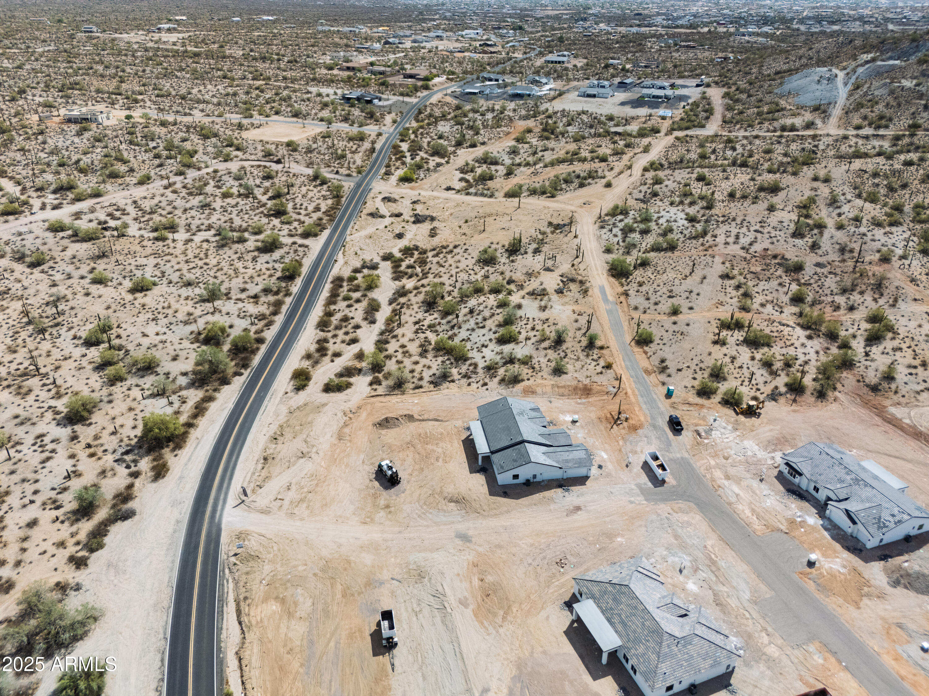 0 North Brenner Pass Road, Unit F Queen Creek, AZ 85144 - Photo 20 of 20 a view of water heater room with wooden floor