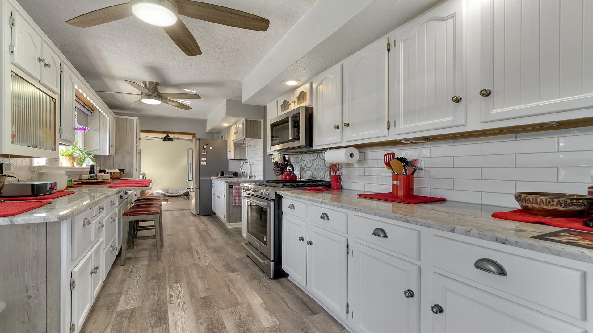 2112 South Alpine Road Rockford, IL 61108 - Photo 11 of 43 a kitchen filled with white cabinets and appliances