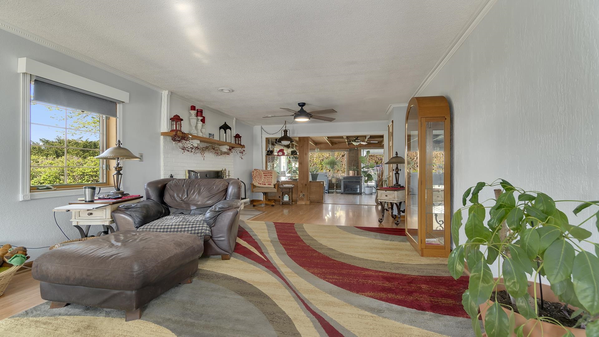 2112 South Alpine Road Rockford, IL 61108 - Photo 15 of 43 a living room with furniture and a potted plant