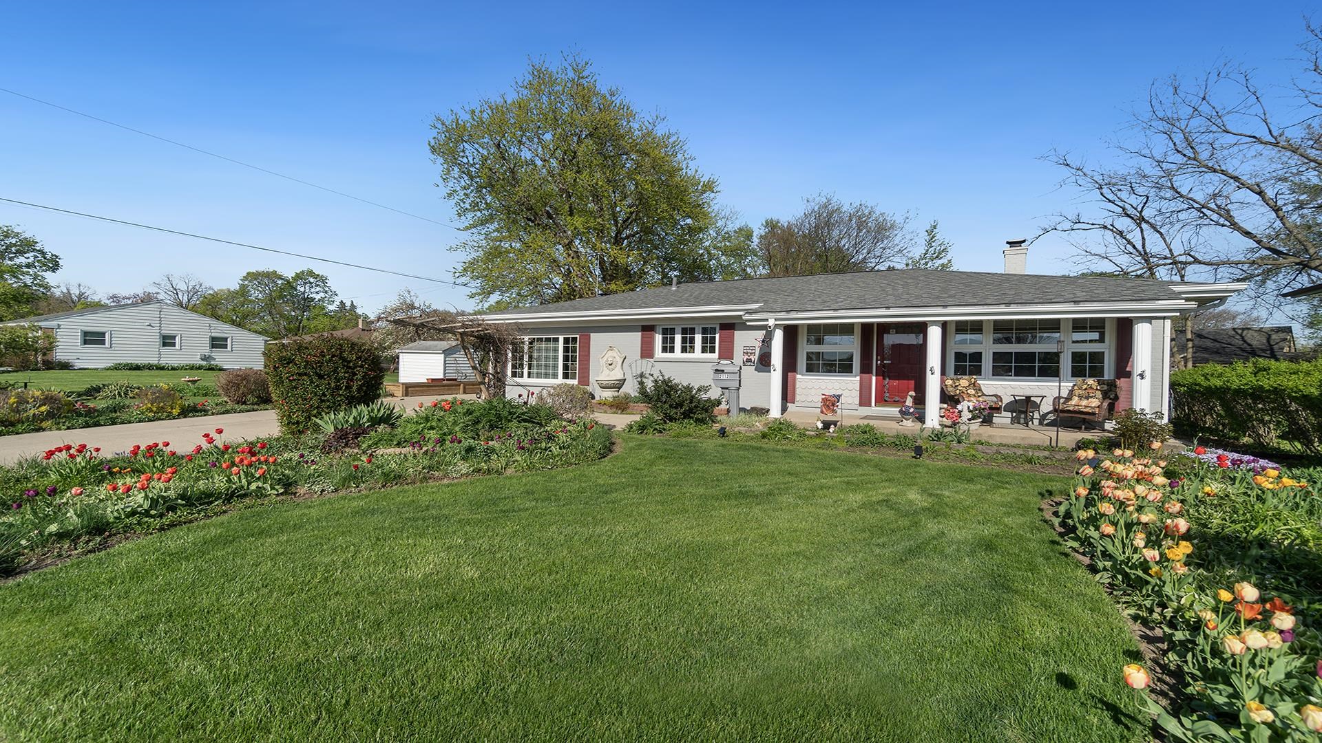 2112 South Alpine Road Rockford, IL 61108 - Photo 2 of 43 a view of a house with a yard patio and swimming pool
