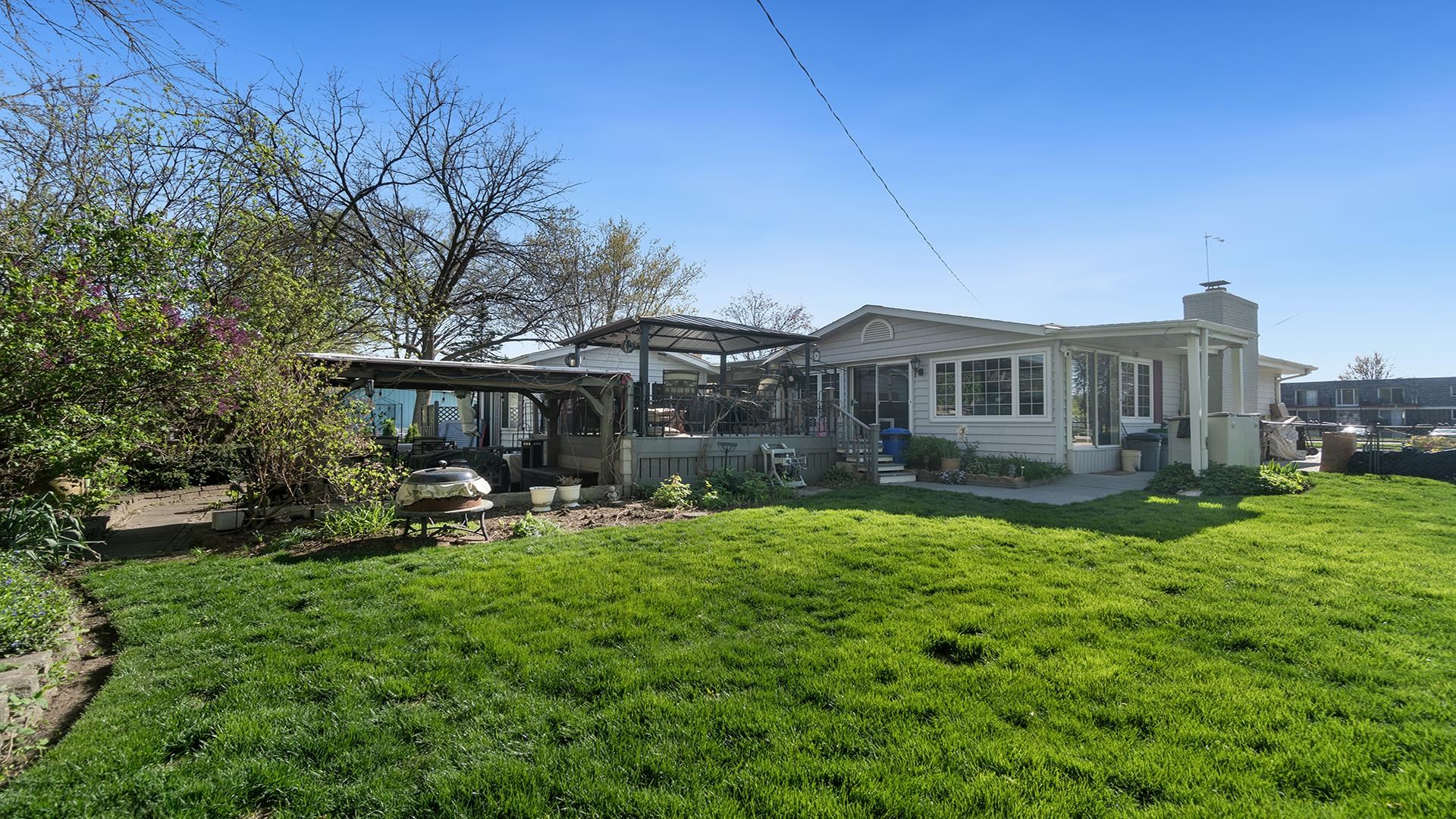 2112 South Alpine Road Rockford, IL 61108 - Photo 42 of 43 a view of a house with backyard and sitting area