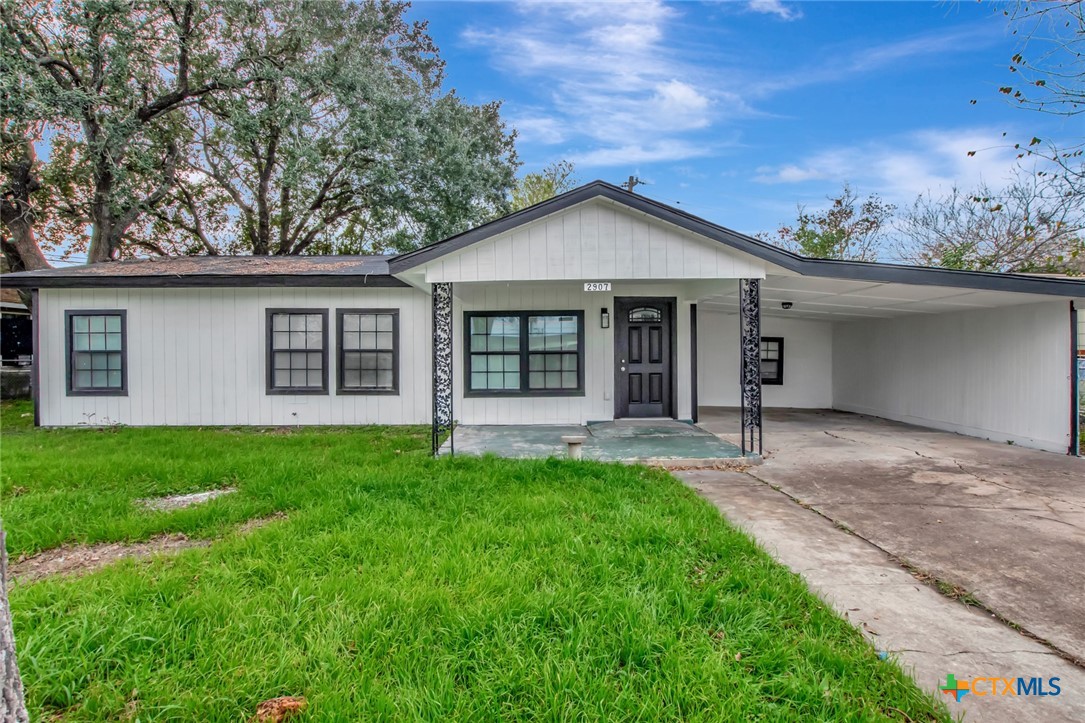 2907 Cedar Street Victoria, TX 77901 - Photo 1 of 45 a front view of a house with a yard and porch
