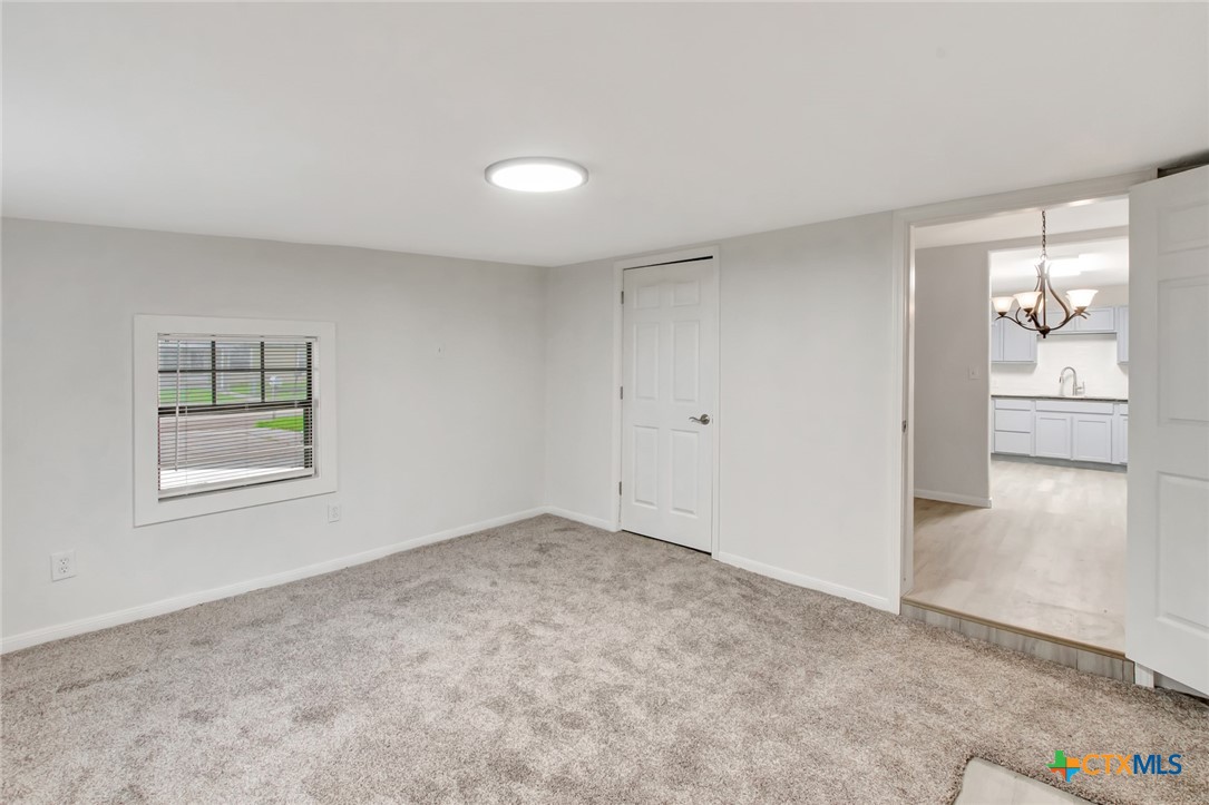 2907 Cedar Street Victoria, TX 77901 - Photo 13 of 45 an empty room with windows
