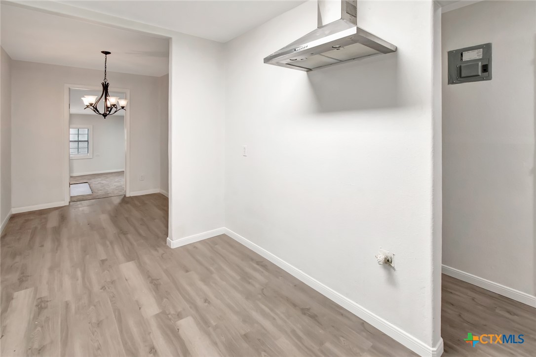 2907 Cedar Street Victoria, TX 77901 - Photo 19 of 45 a view of empty room with wooden floor
