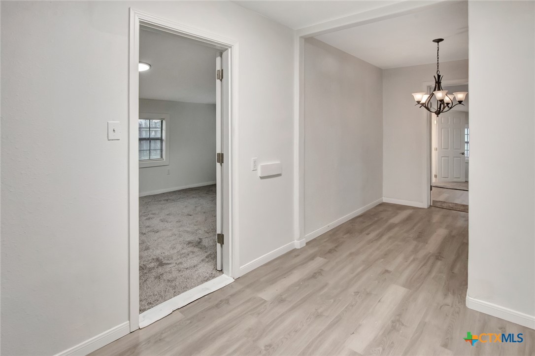 2907 Cedar Street Victoria, TX 77901 - Photo 20 of 45 wooden floor in an empty room