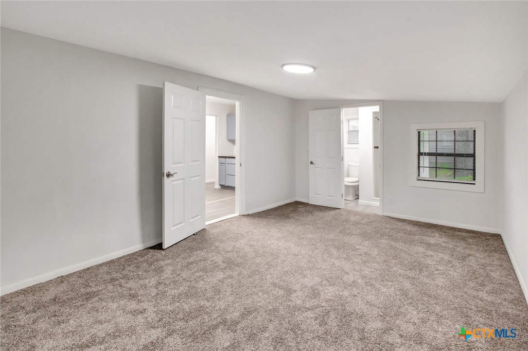 2907 Cedar Street Victoria, TX 77901 - Photo 23 of 45 a view of an empty room with a window