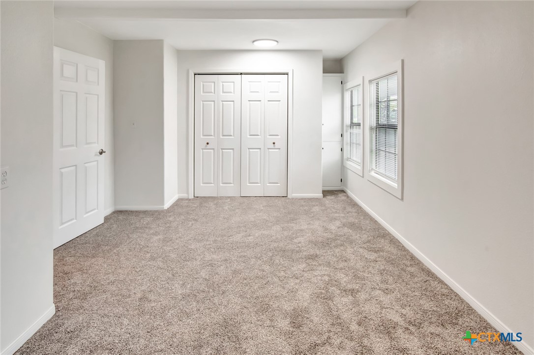 2907 Cedar Street Victoria, TX 77901 - Photo 36 of 45 an empty room with windows