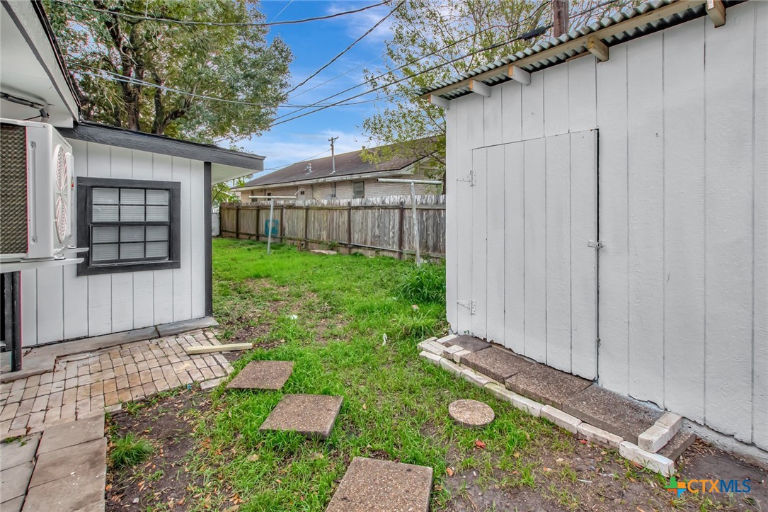 2907 Cedar Street Victoria, TX 77901 - Photo 38 of 45 a backyard of a house with lots of green space
