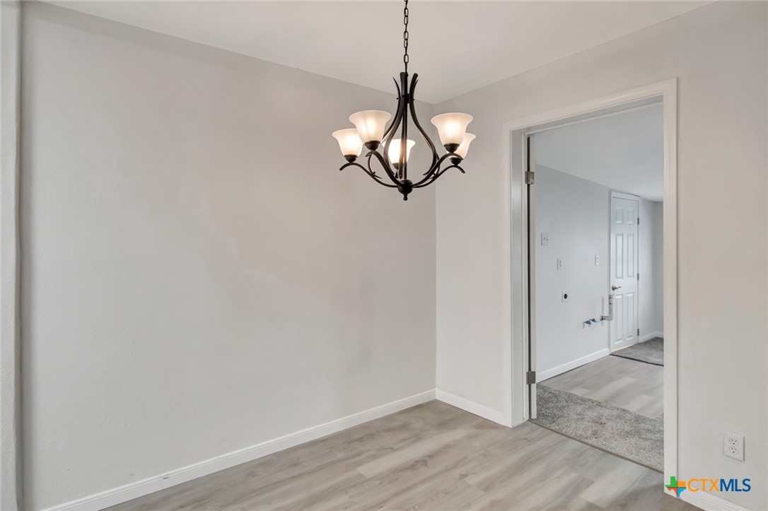 2907 Cedar Street Victoria, TX 77901 - Photo 6 of 45 a view of a decorative light in a hallway